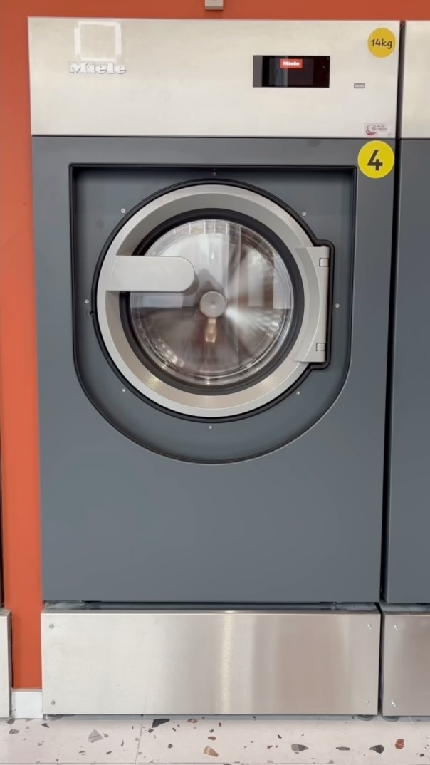 A Miele professional front-loading washing machine at Relax a Wash laundrette in Corrimal